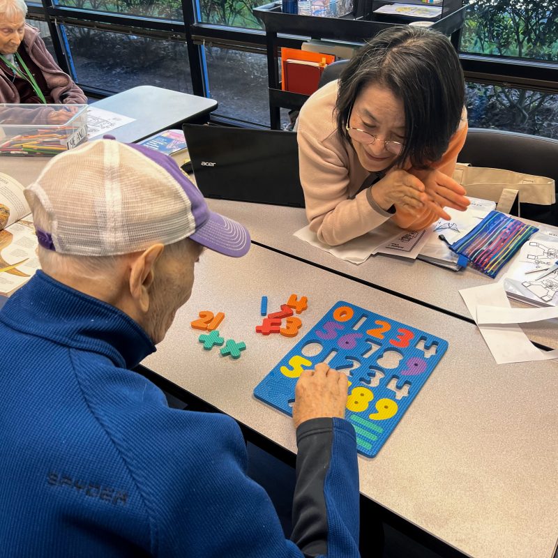 PCH staff doing puzzles with clients